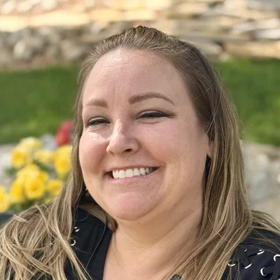 Dentist Cottonwood Heights UT Michell Team A headshot photo of Michell from Van Leeuwen Dental